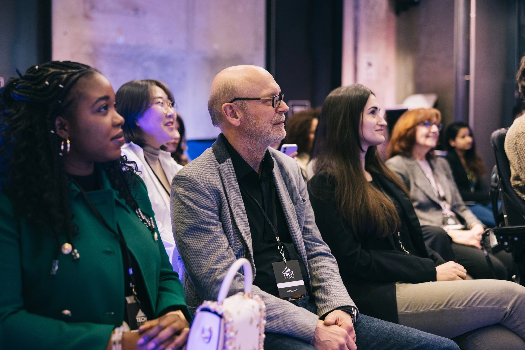 Audience listening at a technology conference
