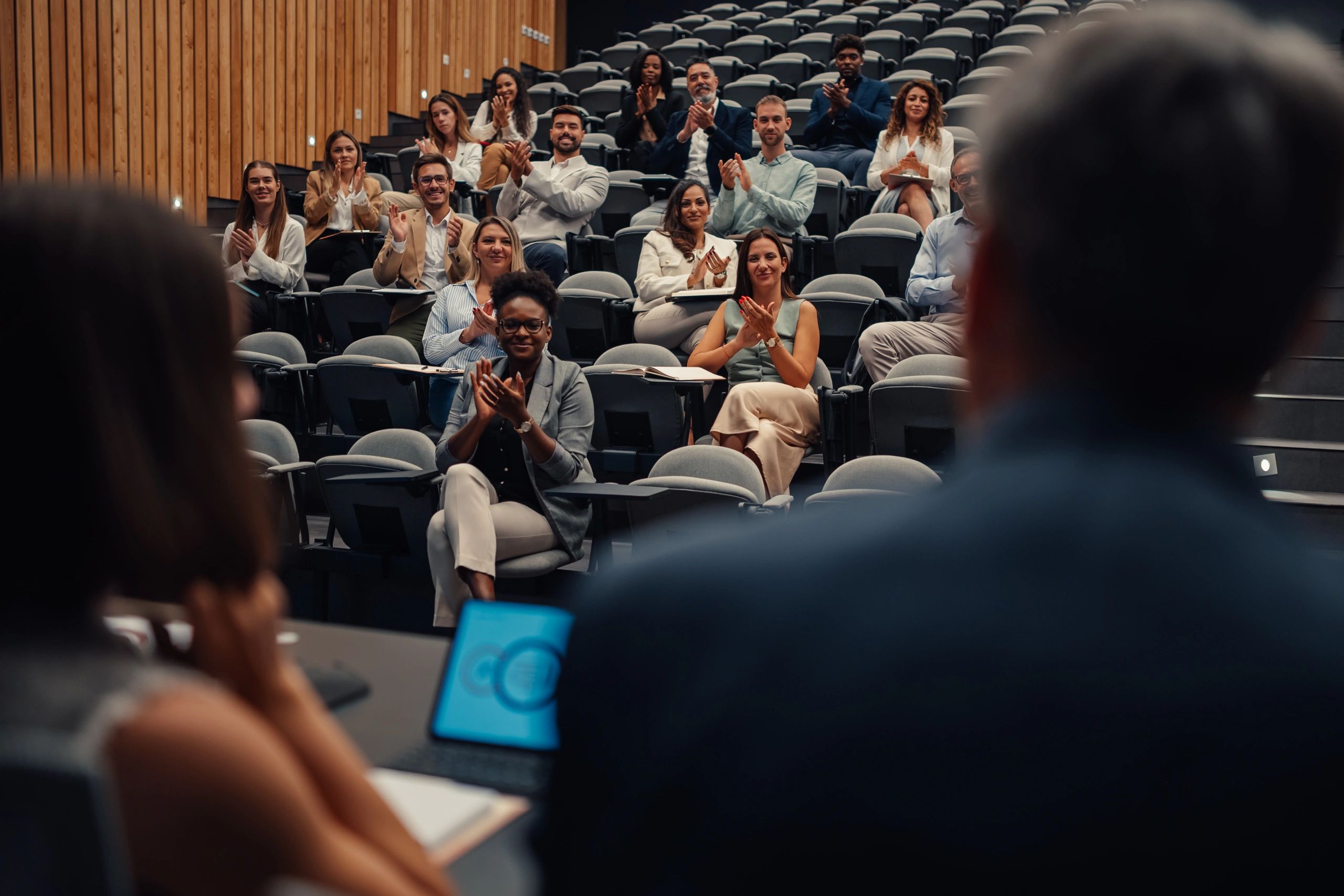Audience attending a technology conference session